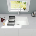 White quartz composite undermount kitchen sink with roll-up drying rack