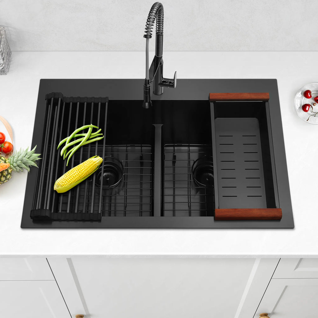 Black double bowl sink with roll-up drying rack and colander