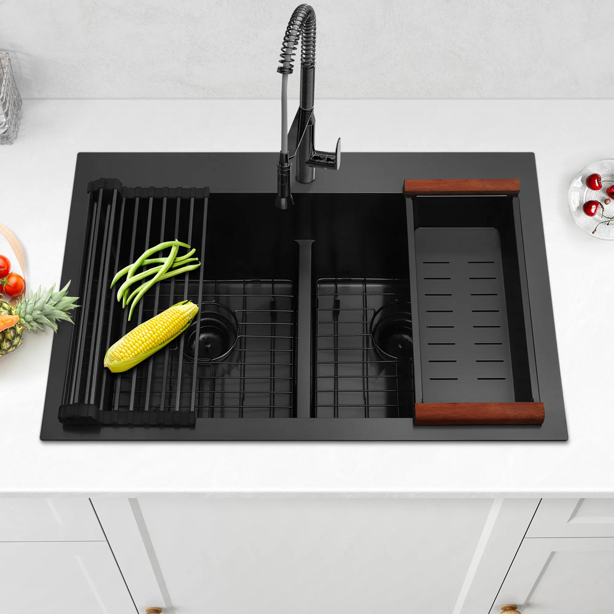 Black double bowl sink with roll-up drying rack and colander