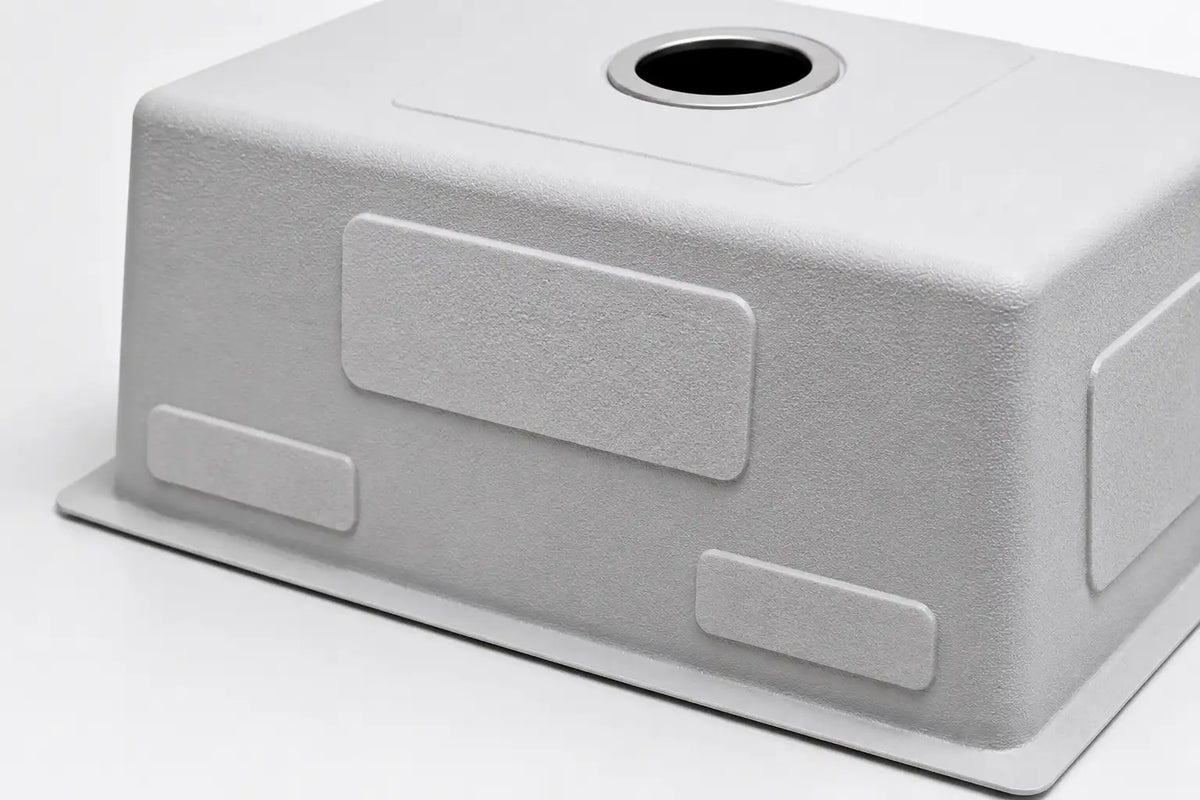 LQS stainless steel sink underside with sound-dampening pads and protective undercoating