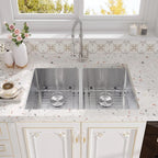 Stainless steel double bowl kitchen sink installed in a kitchen countertop