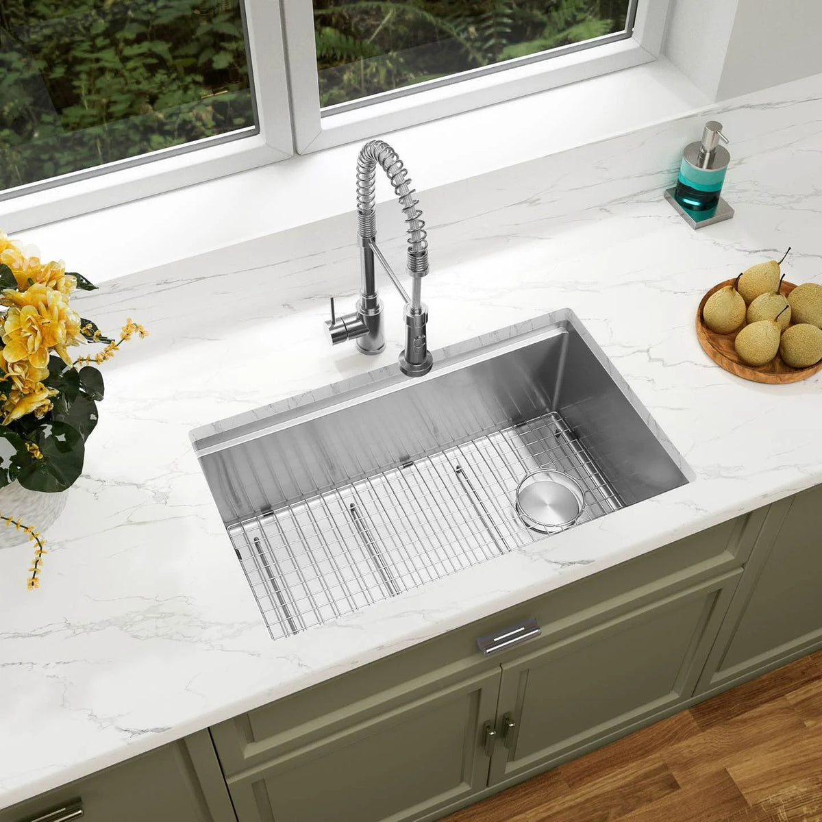 LQS stainless steel workstation kitchen sink installed in a white countertop with right offset drain
