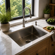 Stainless steel kitchen sink in a bright modern kitchen
