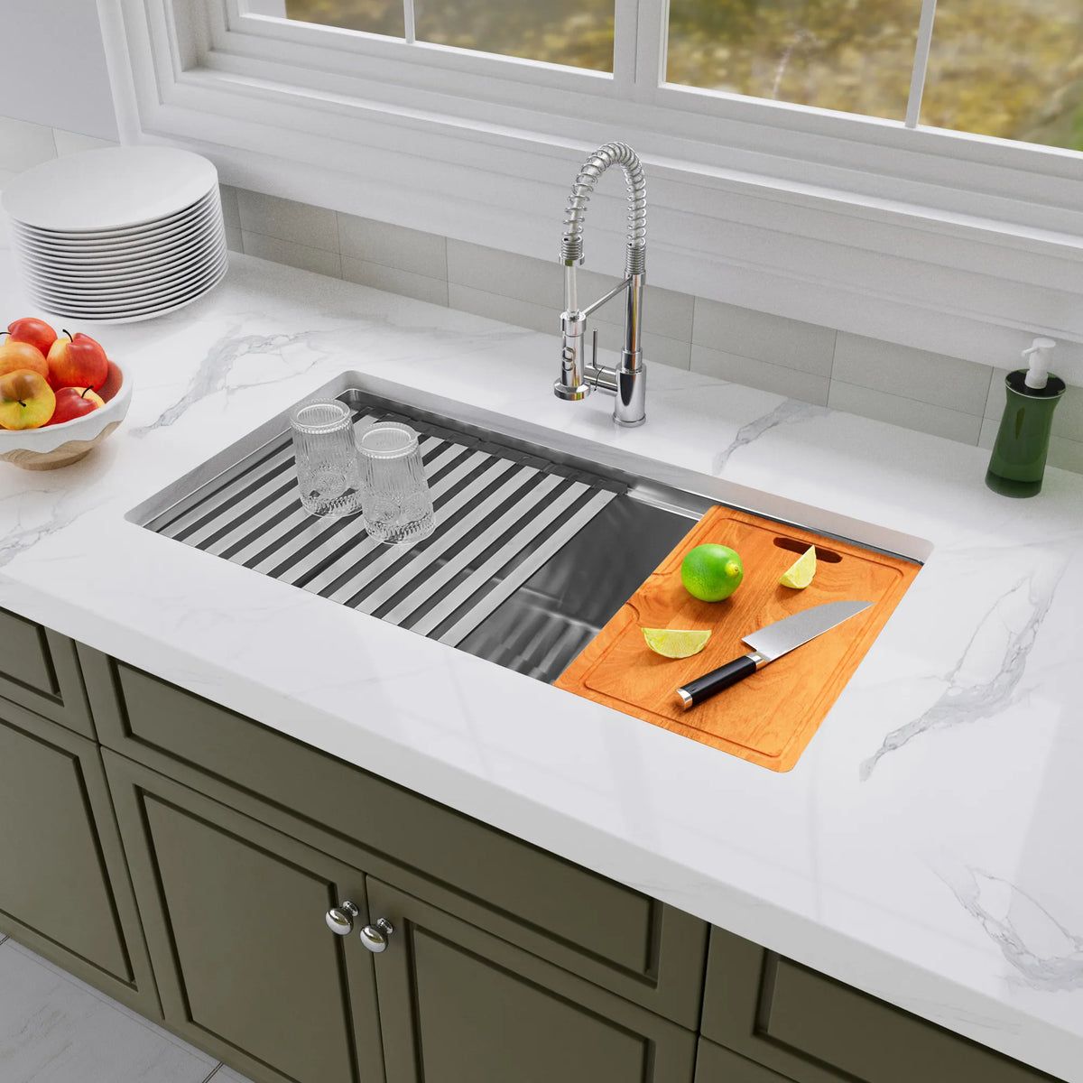 33 inch stainless steel undermount workstation sink installed in kitchen countertop